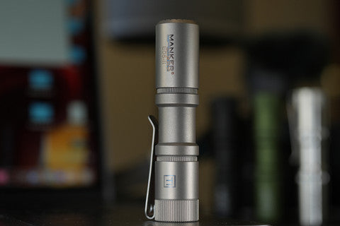 E05 II 1300 Lumens Titanium / Stonewashed Flashlight, with 14500 Battery (Compatible with AA), For Camping, Hiking