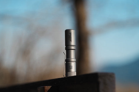 E05 II 1300 Lumens Titanium / Stonewashed Flashlight, with 14500 Battery (Compatible with AA), For Camping, Hiking